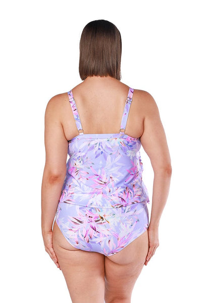 Back of model wearing wearing floral tankini top with adjustable straps for curvy women