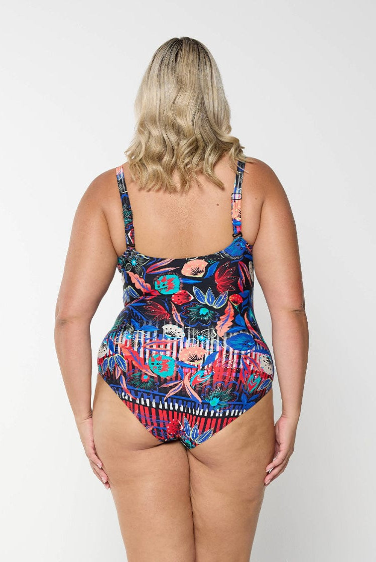 Back of model wearing multi coloured one piece with floral print and adjustable and removable straps