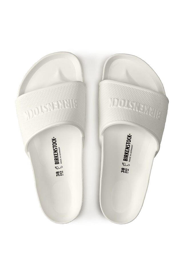overview image of the white wide slide birkenstock brand rubber sandal
