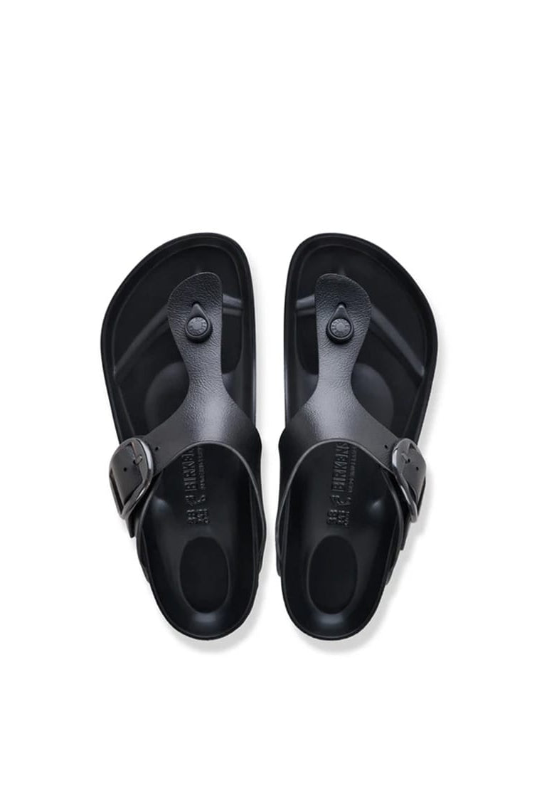 A pair of black silicone slide sandals shown from a top-down view on a clean white background.