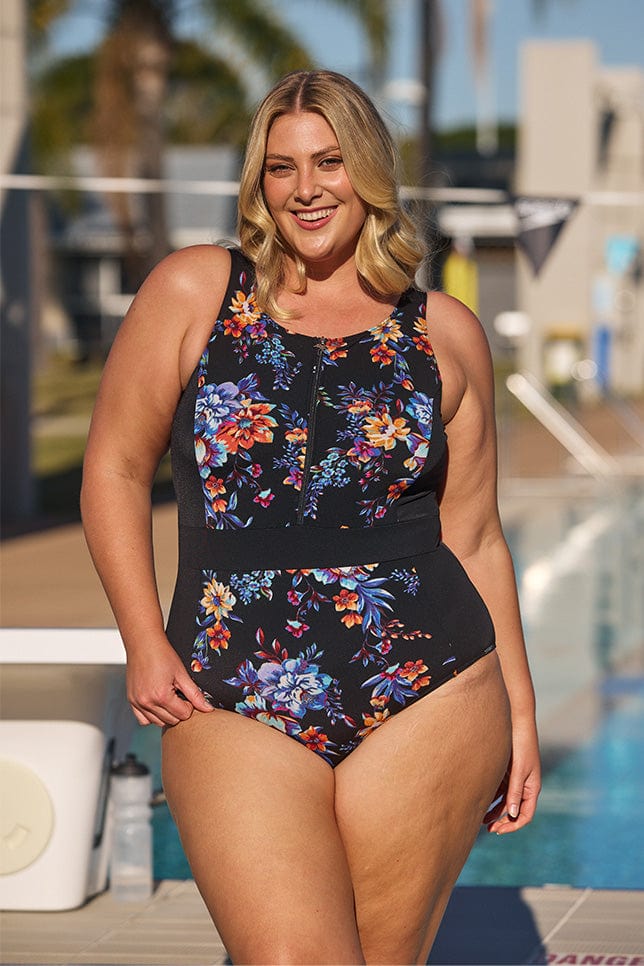 Blonde curve model wearing chlorine resistant one piece in floral print