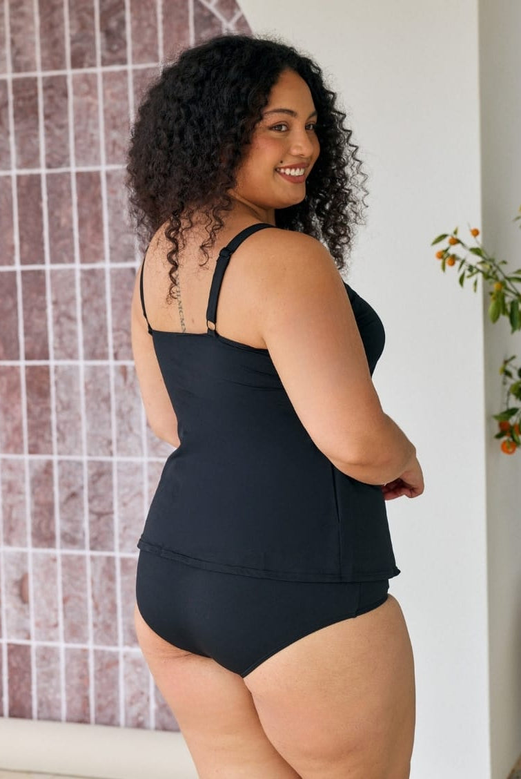Back of model showing off tank tankin top in chlorine resistant with adjustable straps
