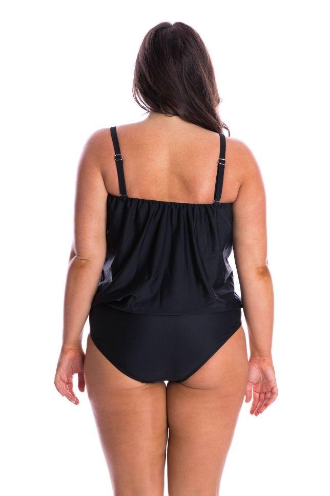 Curve model wearing black flouncy bandeau one piece with removable straps