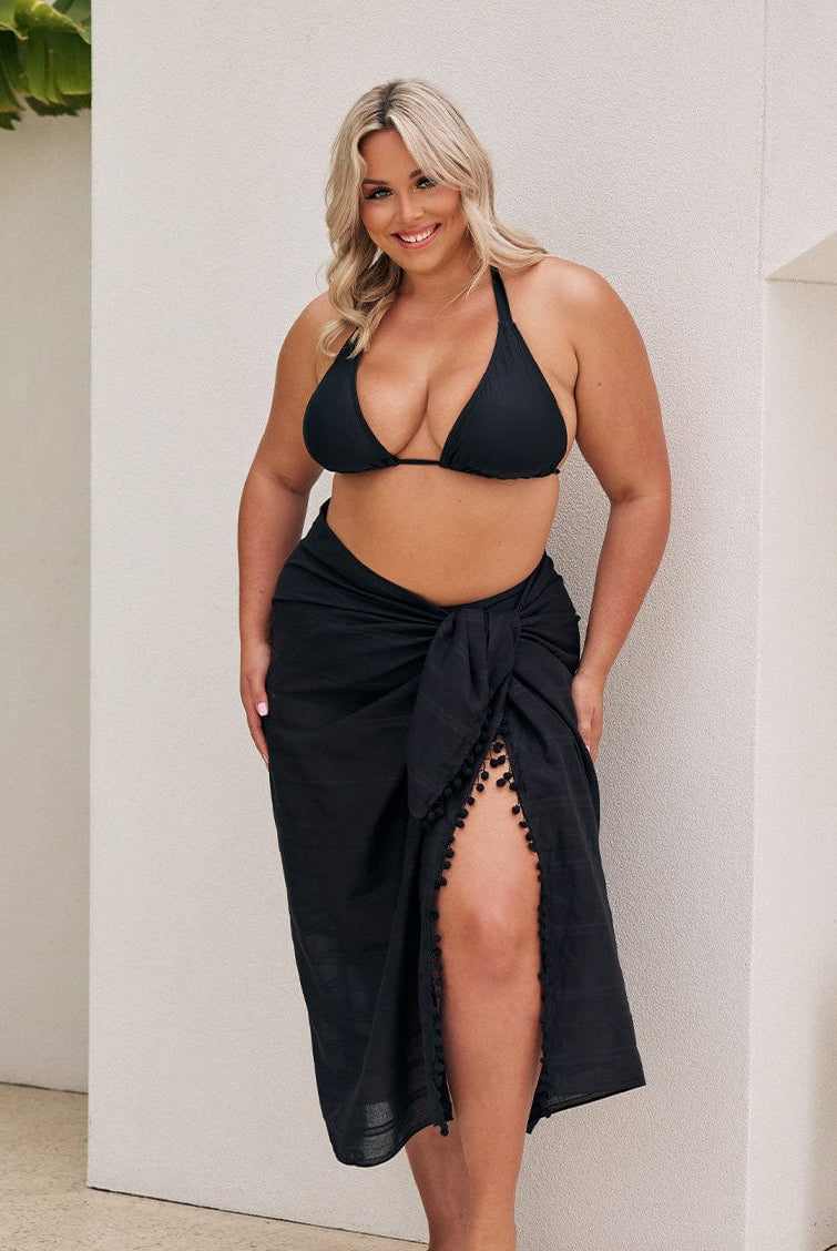 Blonde curve model wearing a long maxi cotton sarong
