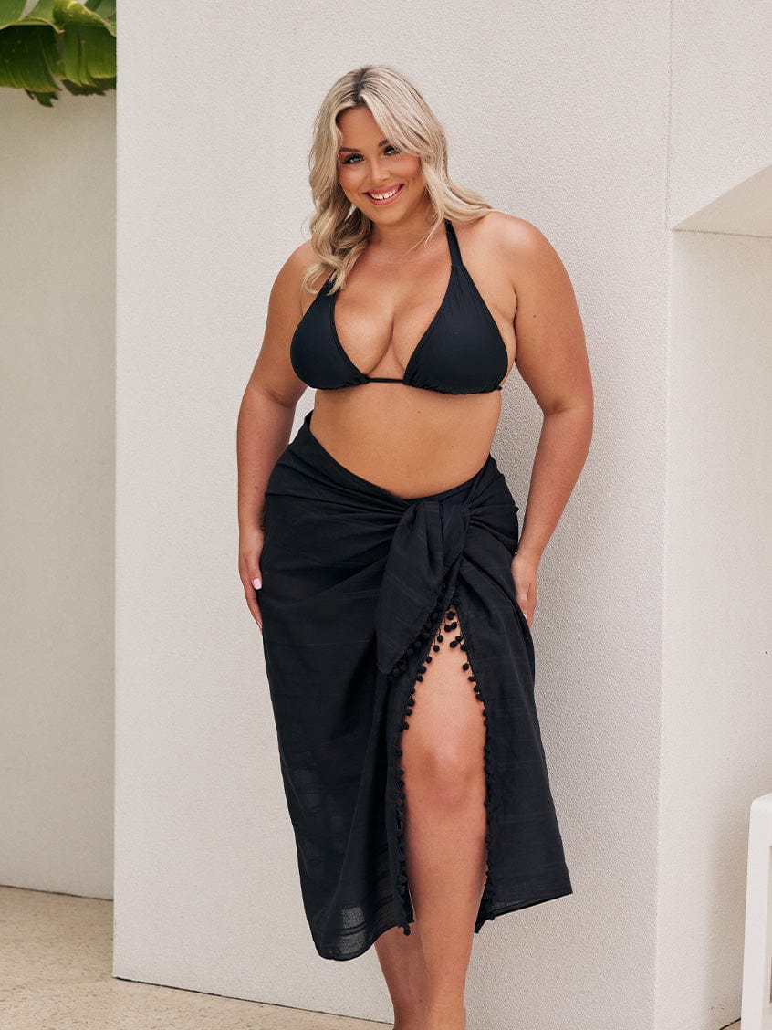 Blonde curve model wearing a long maxi cotton sarong