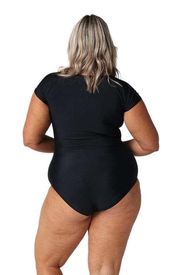 Model wearing black short sleeve tie front one piece swimsuit