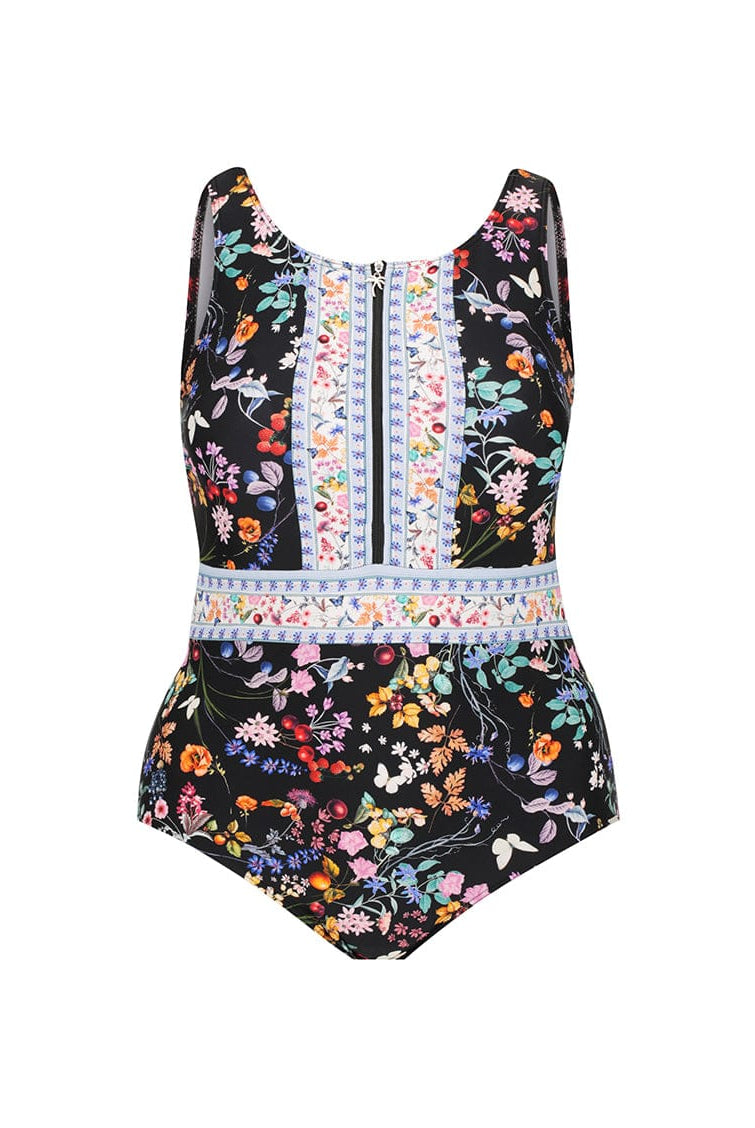 Floral patterned swimsuit with colorful accents on a white background