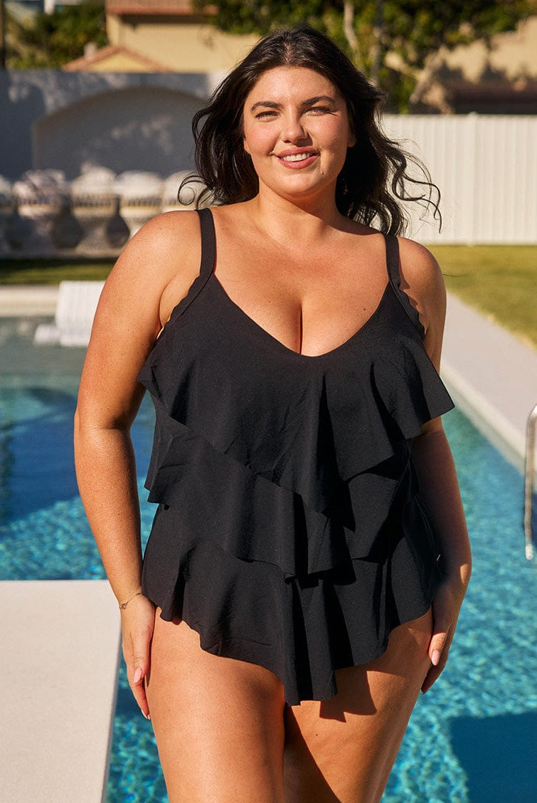 Women wearing chlorine resistant swimwear tankini top in black