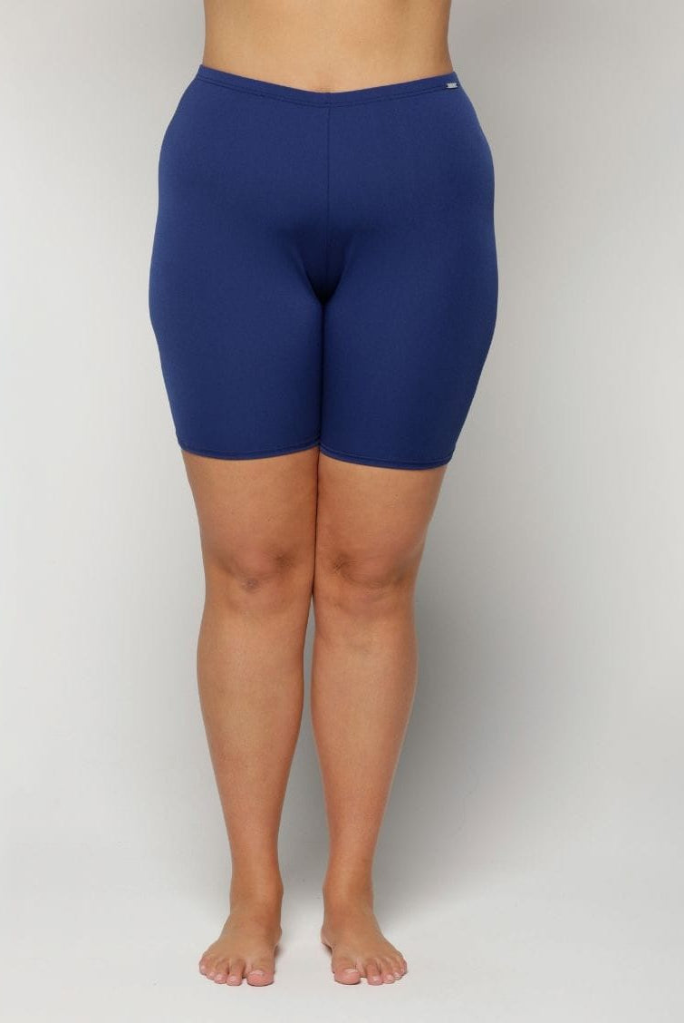 Curve model in blue swim shorts in chlorine resistant