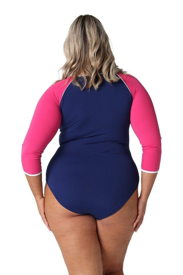 Back of model wearing flattering high neck zip front one piece with 3/4 sleeves in chlorine resistant