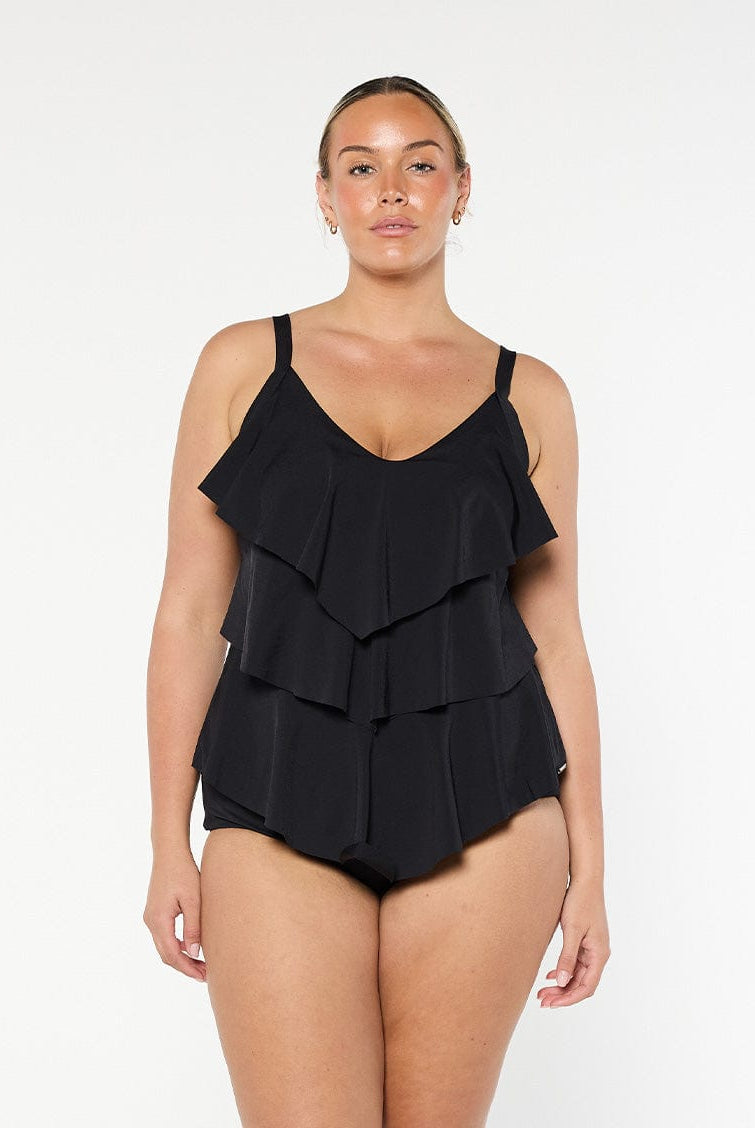 Blonde model wears 3 tier tankini top with chlorine resistant fabric