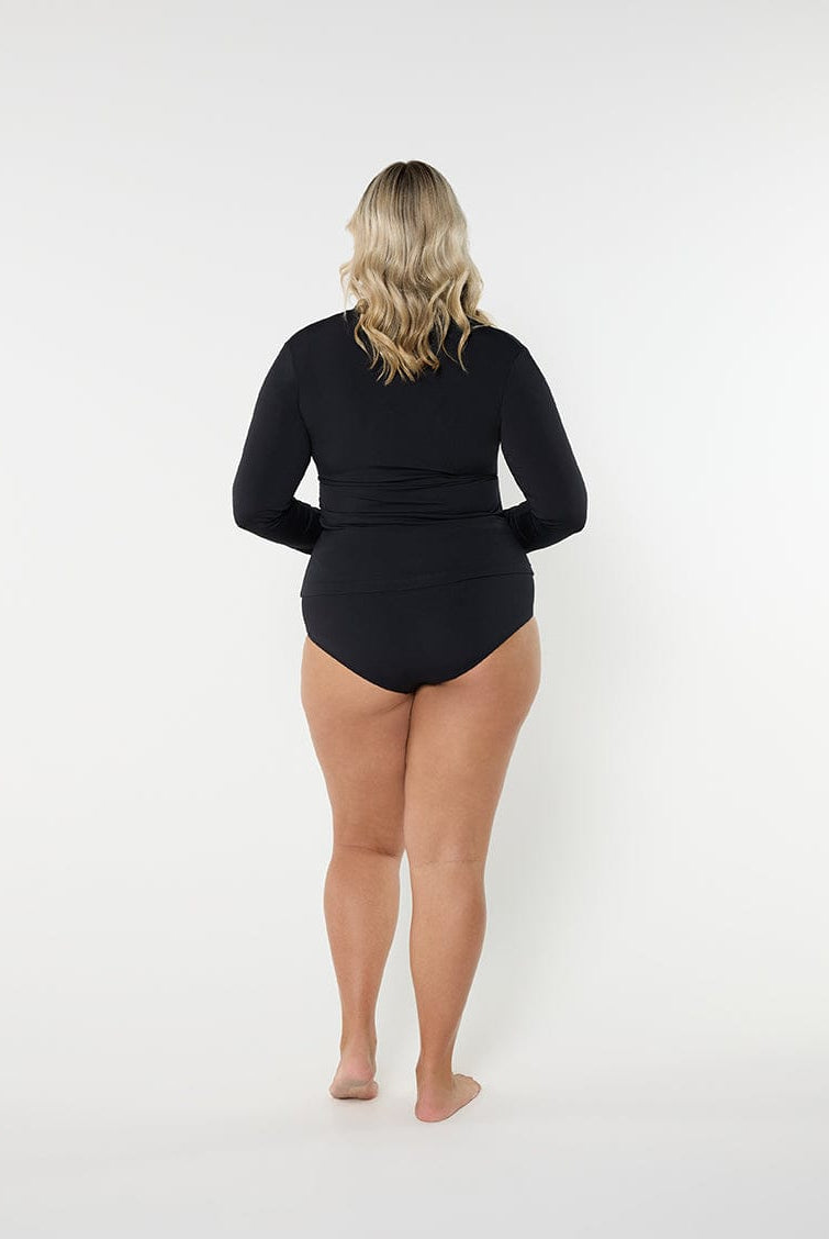 Person wearing a black swimsuit on a white background