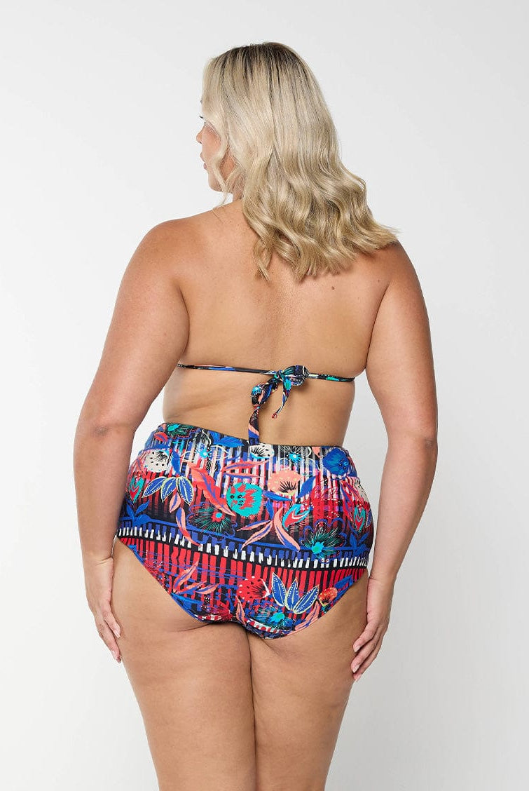Back of model wearing tie up bikini top for curve women