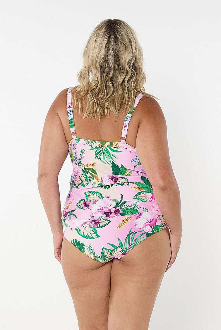 Back of model wearing tiered tankini top with adjustable straps in multi-coloured floral print