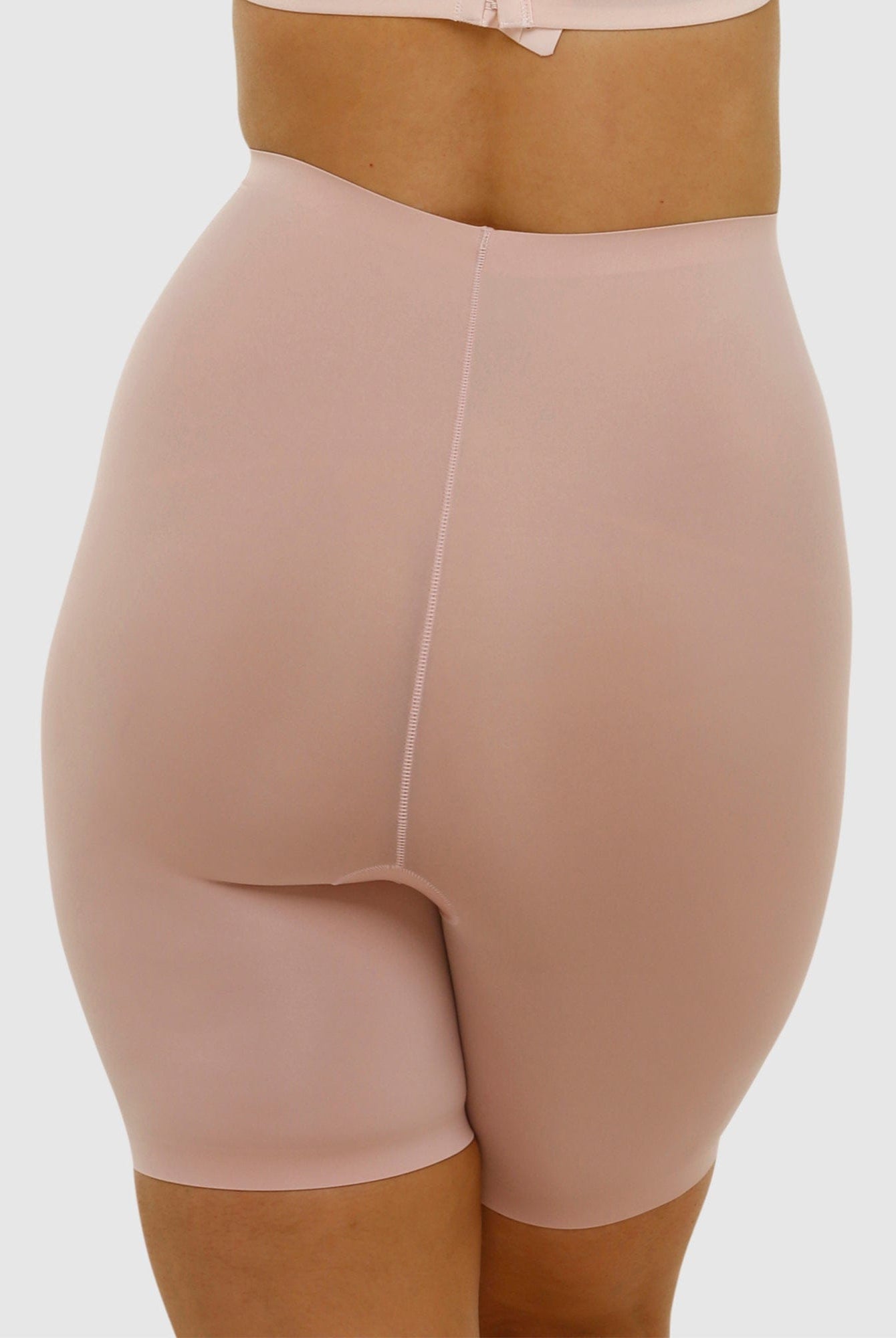 Beige shapewear garment on a white background