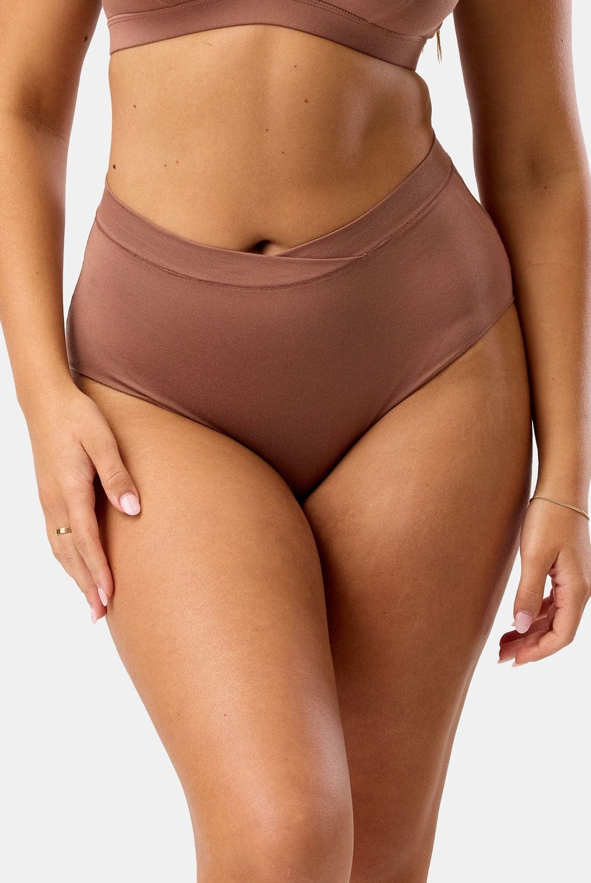 Brown high-waisted bikini on a white background