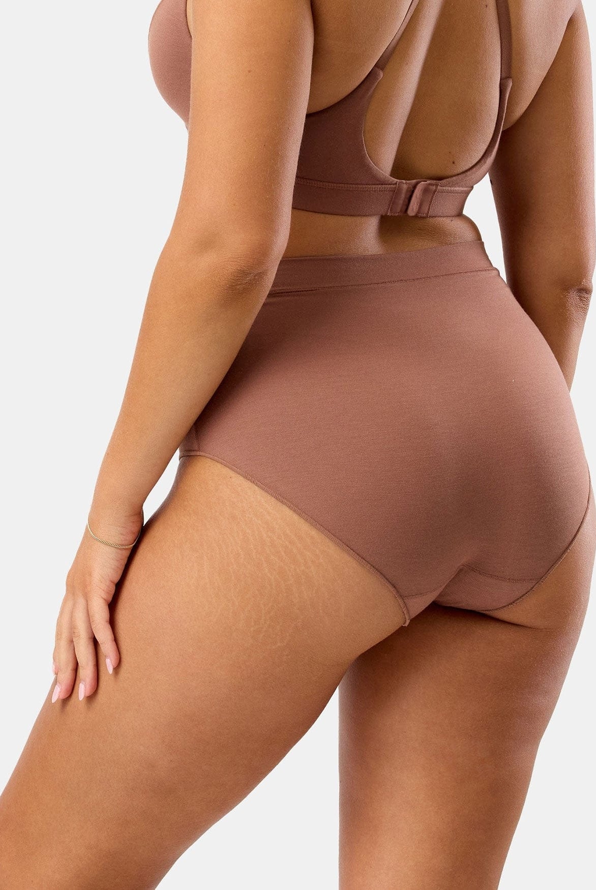 Brown bikini set on a white background