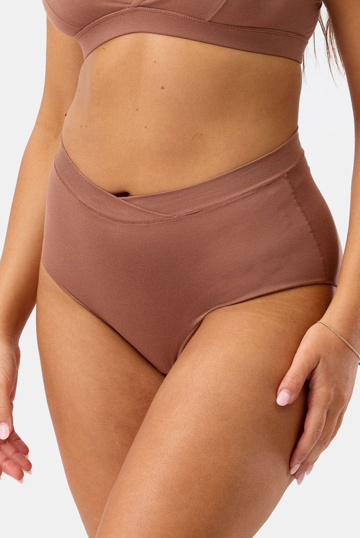 Brown high-waisted bikini bottom on a white background