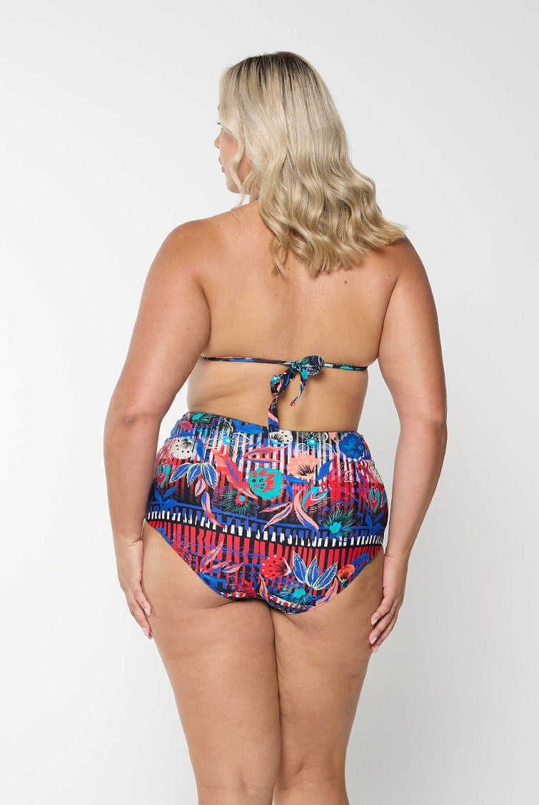 Back of curve model in studio wearing high waisted swim pant with