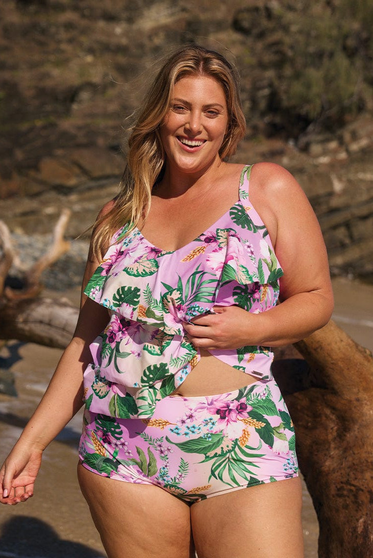 Curve woman wearing high waisted plus size swim pant in tropical print