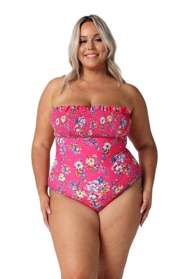 Model wearing hot pink floral shirred one piece