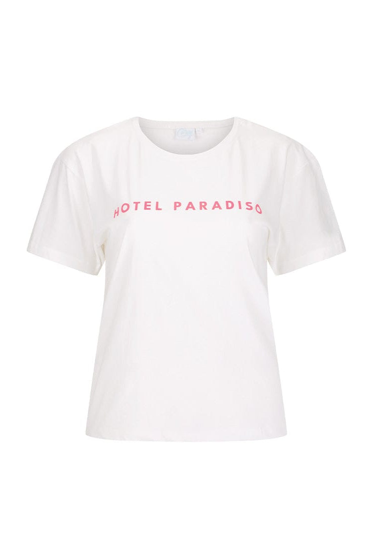 White t-shirt with 'HOTEL PARADISO' text in pink on a white background