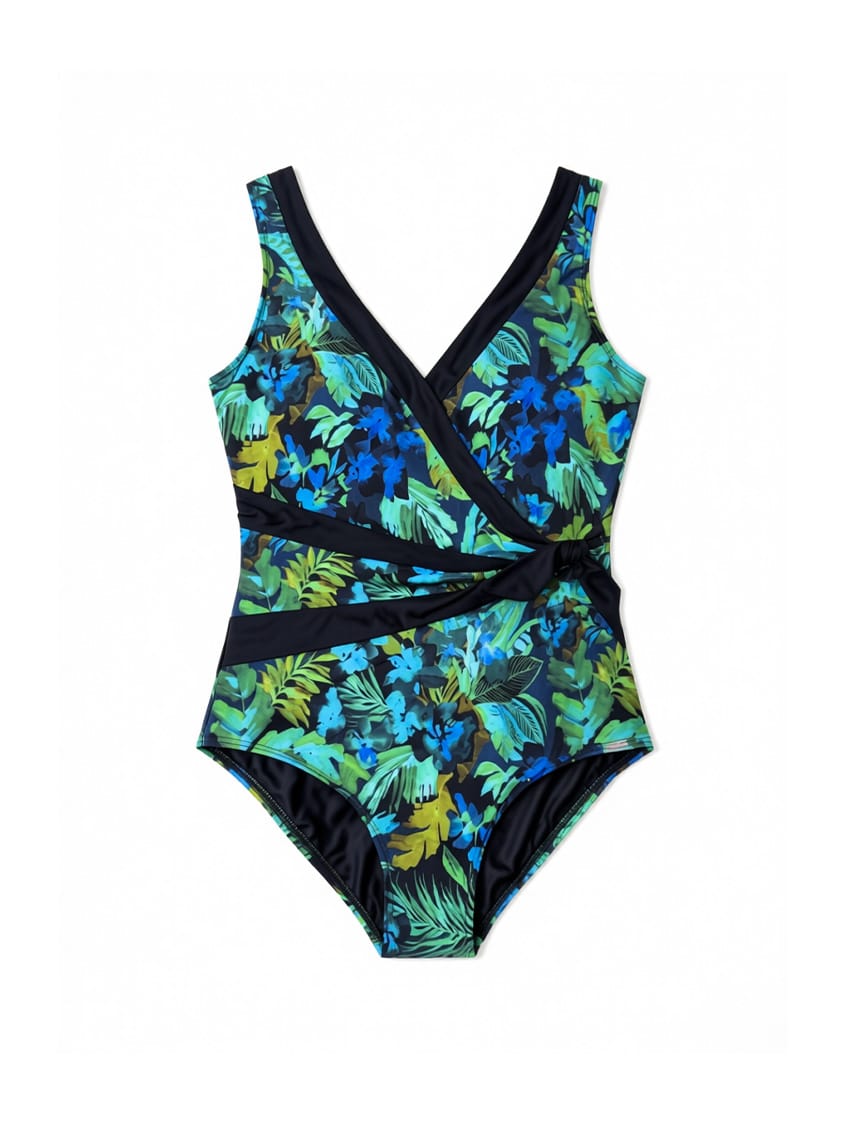 One-piece swimsuit with tropical leaf pattern on a white background