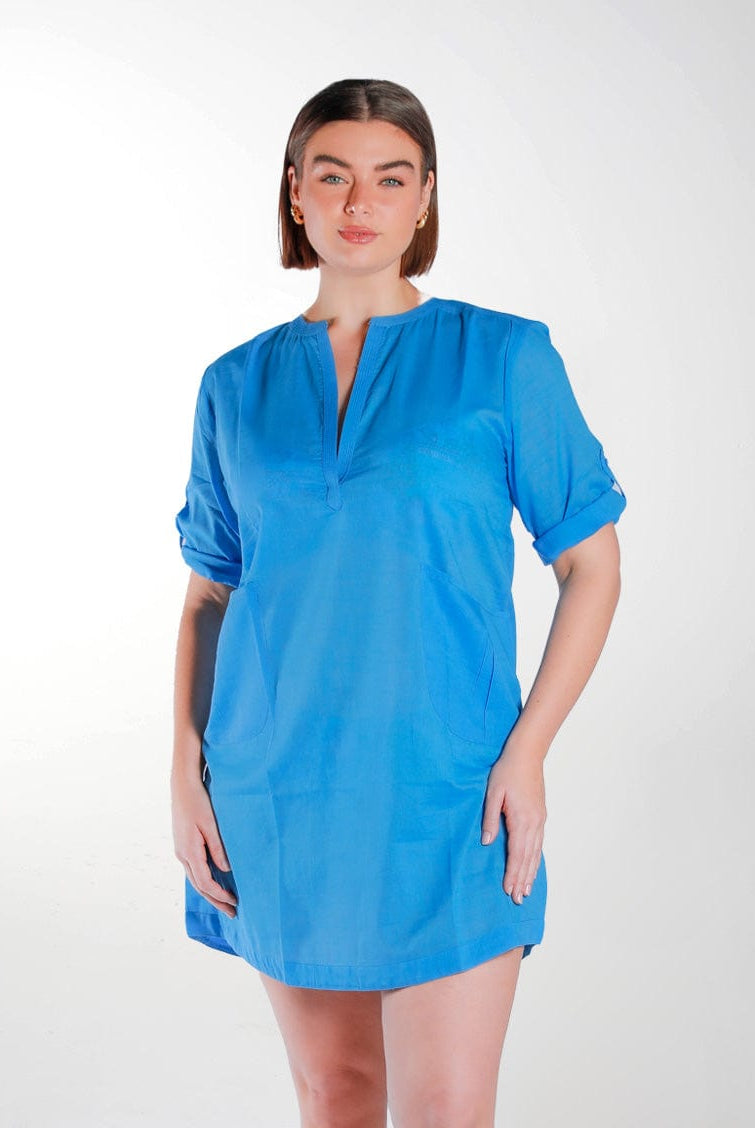 Brunette model in studio wearing provence blue cotton overshirt