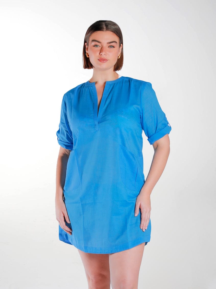 Brunette model in studio wearing provence blue cotton overshirt