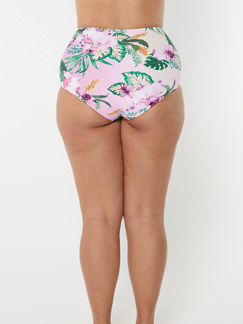 High-waisted bikini bottom with tropical floral pattern on a white background