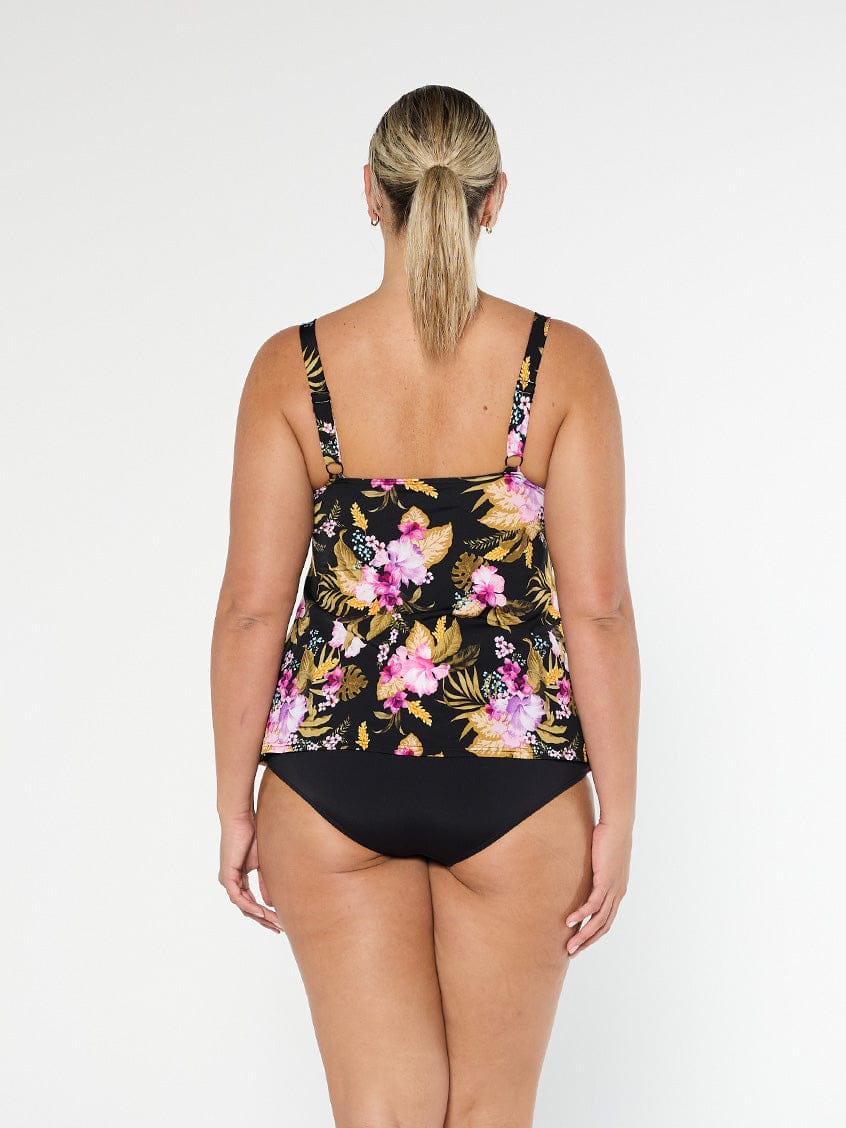 Blonde model shows the back of pool proof tankini top with adjustable straps