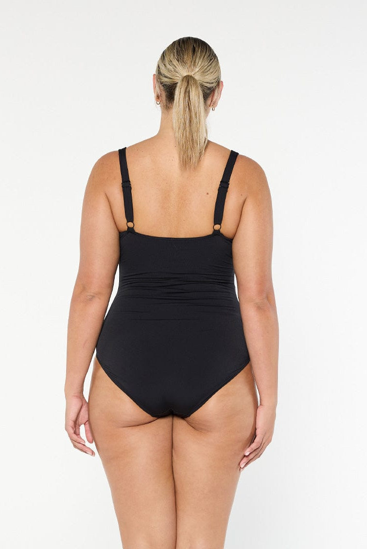 model showing back of black ruched one piece