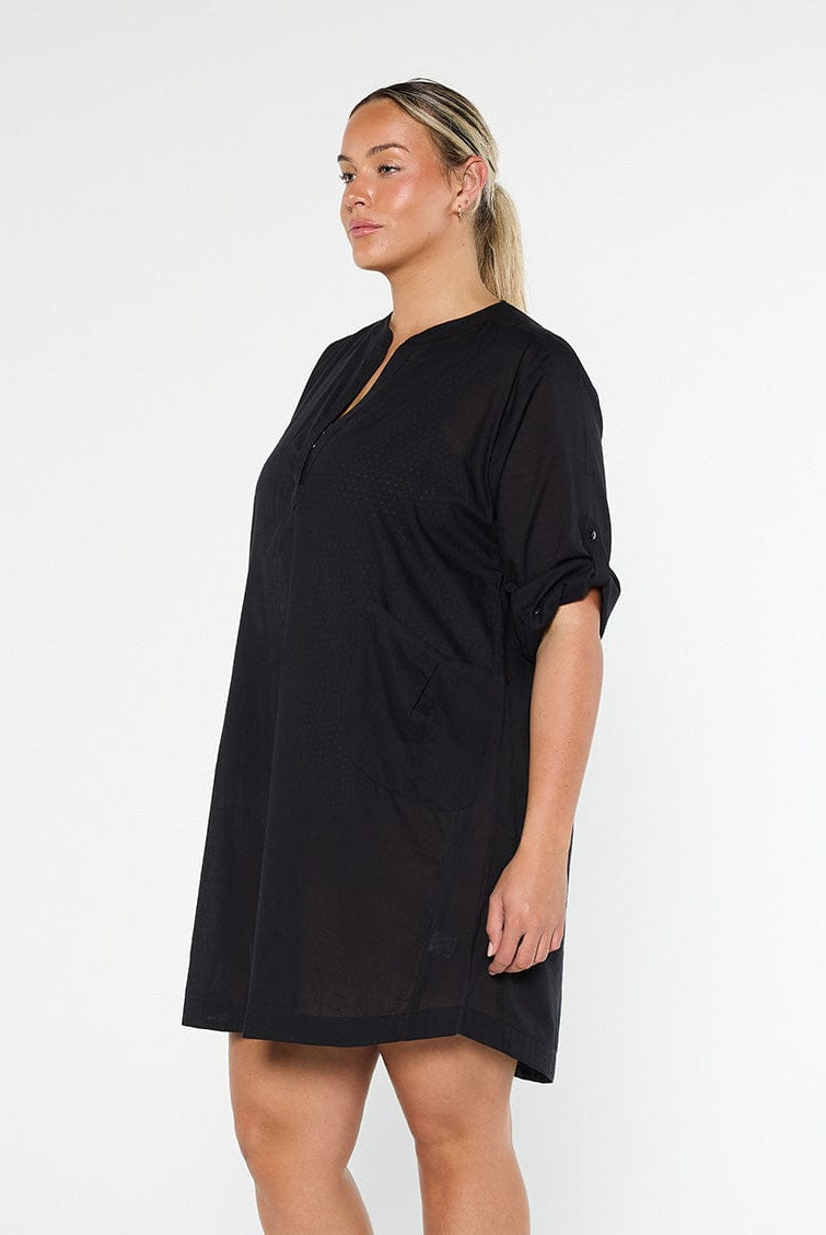 model showing side of black over shirt cover up