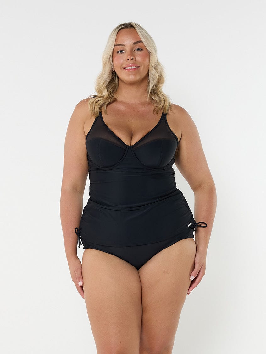 model wearing black mesh detail tankini with underwire