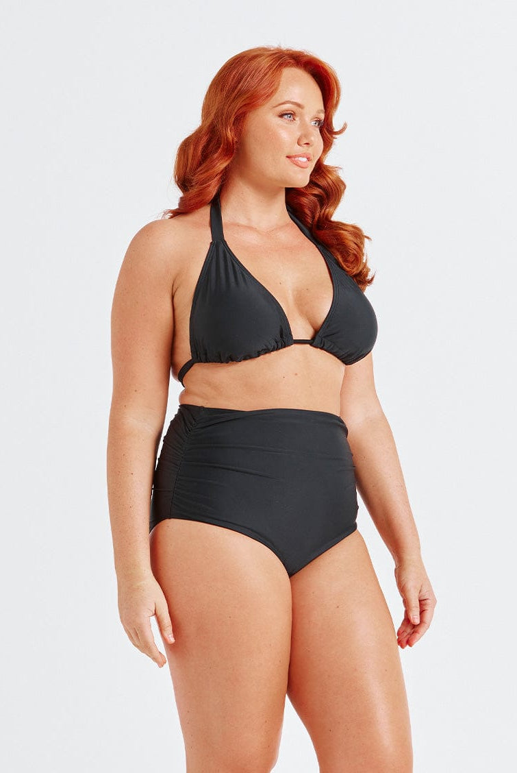 model showing side ruching on black high waisted swim pant