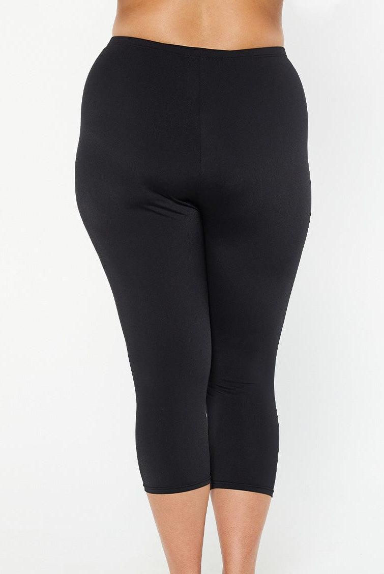 model showing back of black chlorine resistant swim tights
