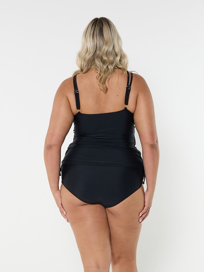 model showing back of side ruched black women's tankini top