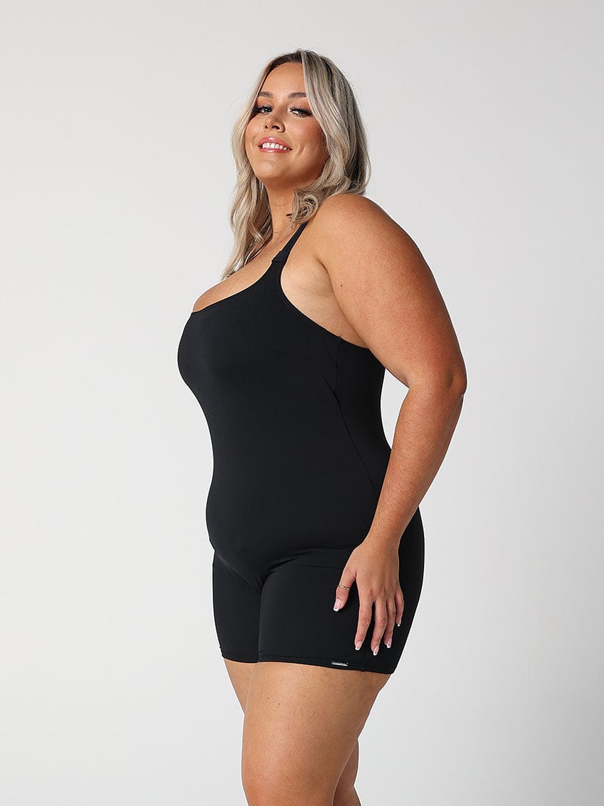 model showing side of black boyleg one piece