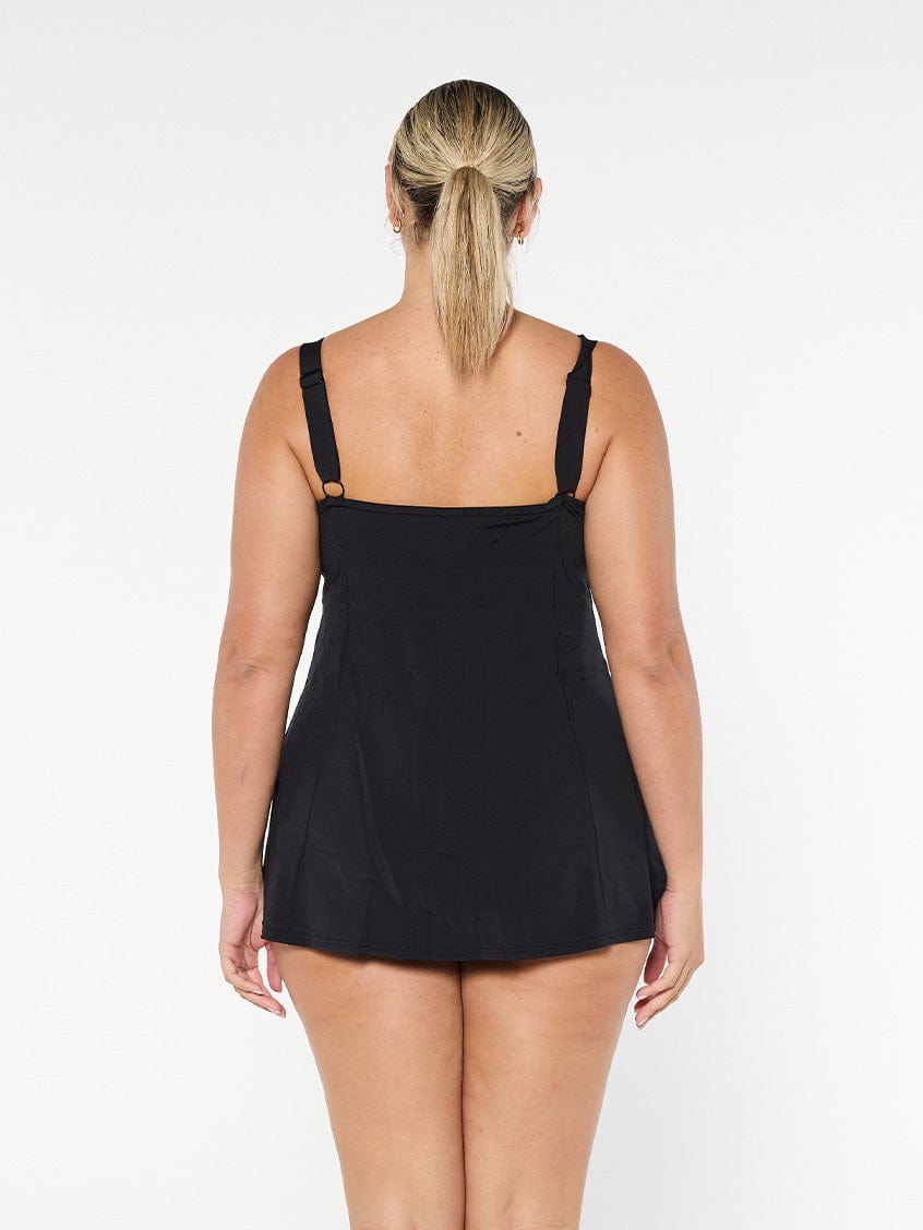 model showing back of women's black swim dress