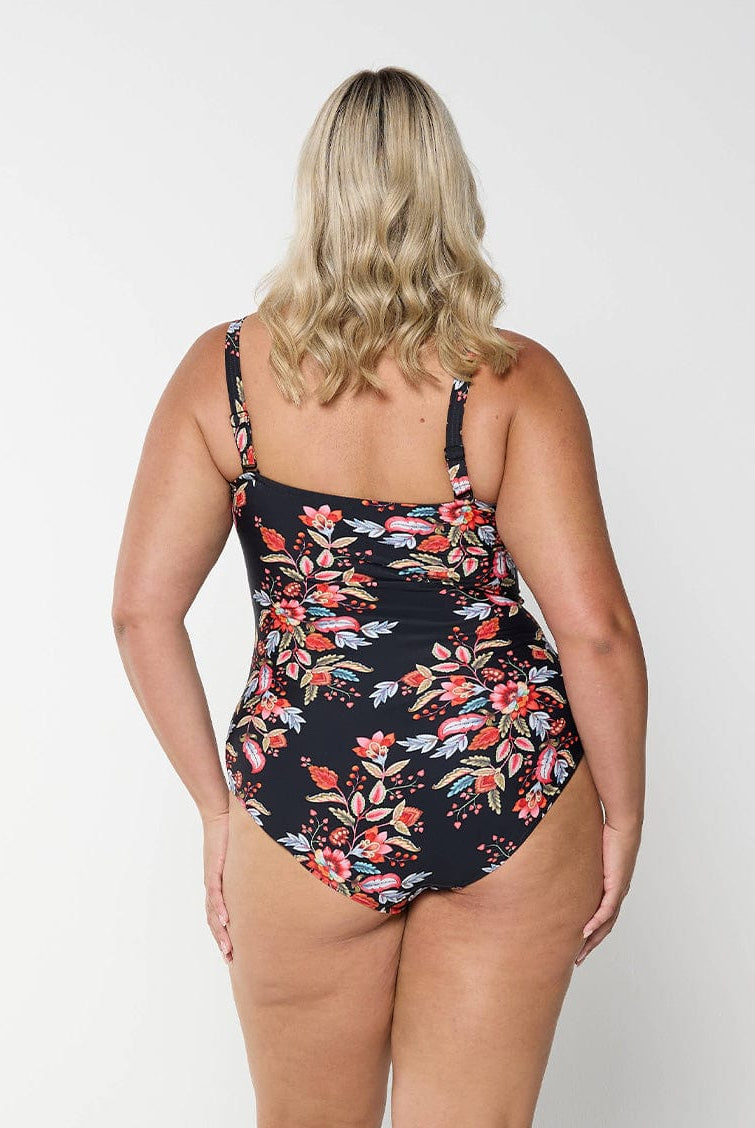 model showing back of flattering red floral swimsuit