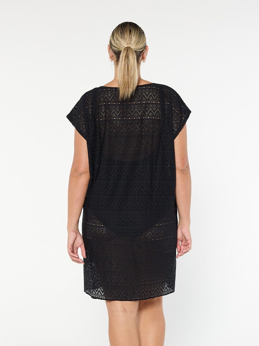 model showing back of black mesh beach dress