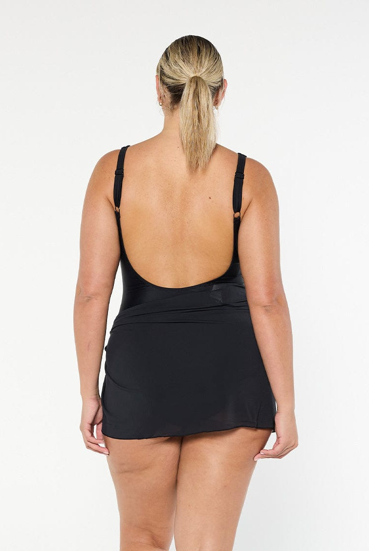 model showing back of black mesh mini skirt