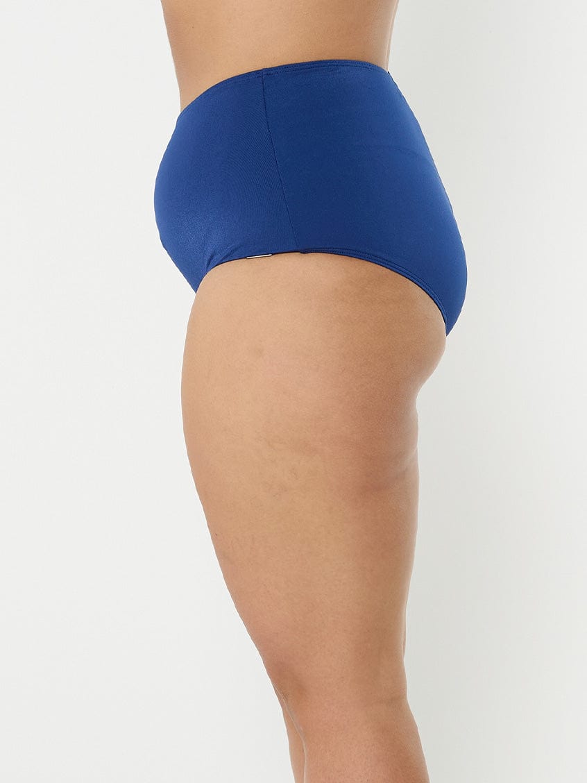 model showing side of navy high waisted swim bottoms