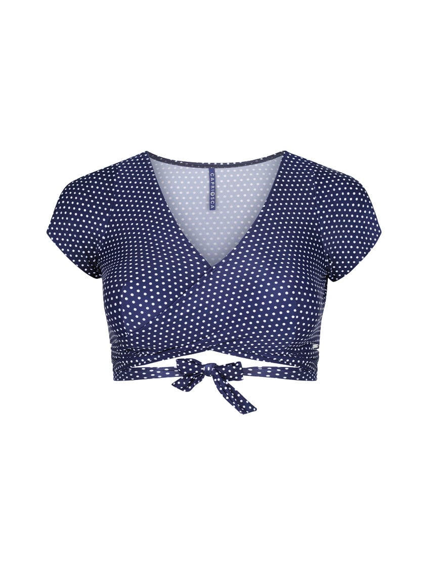 Navy blue polka dot top with a tie back