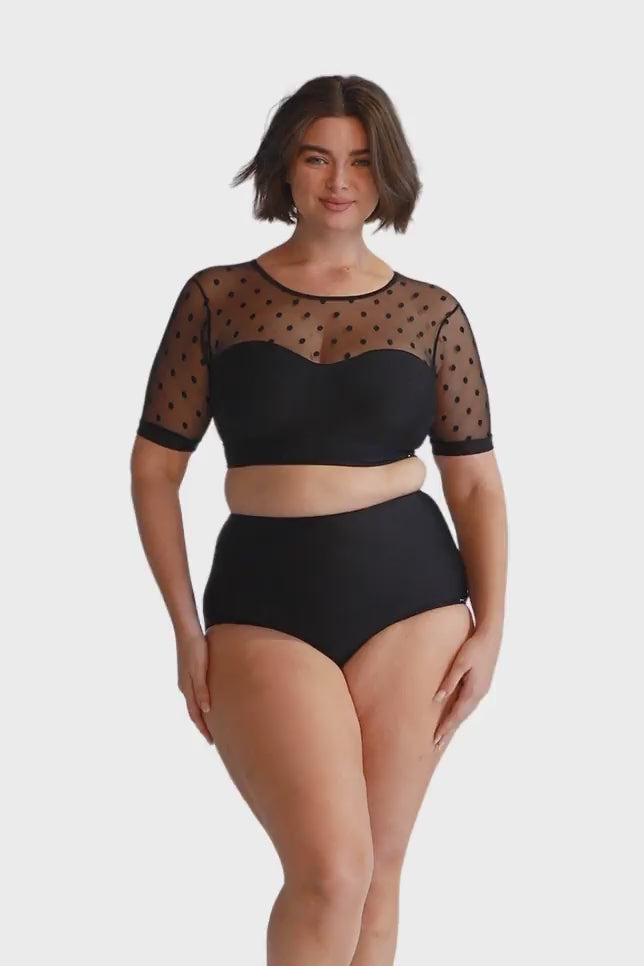 Curve model wearing black crop bikini in polka dot with mesh sleeve detail Australia