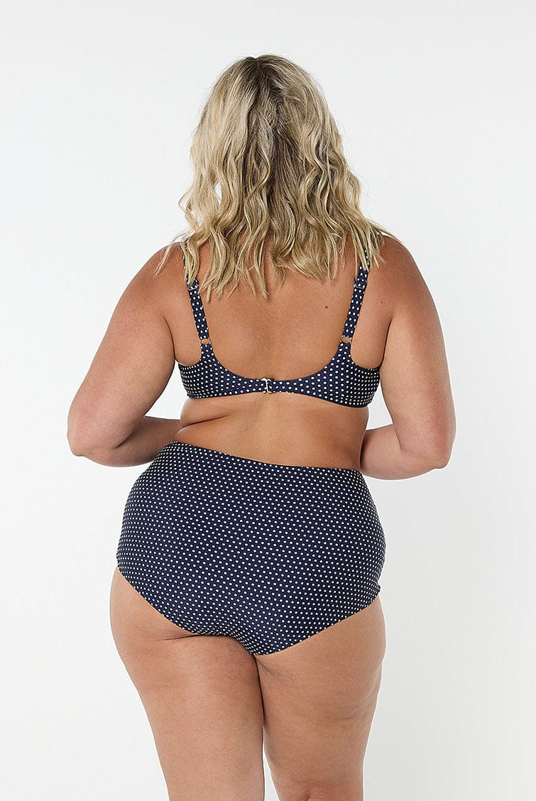 model showing back of navy dots high waisted swim bottom