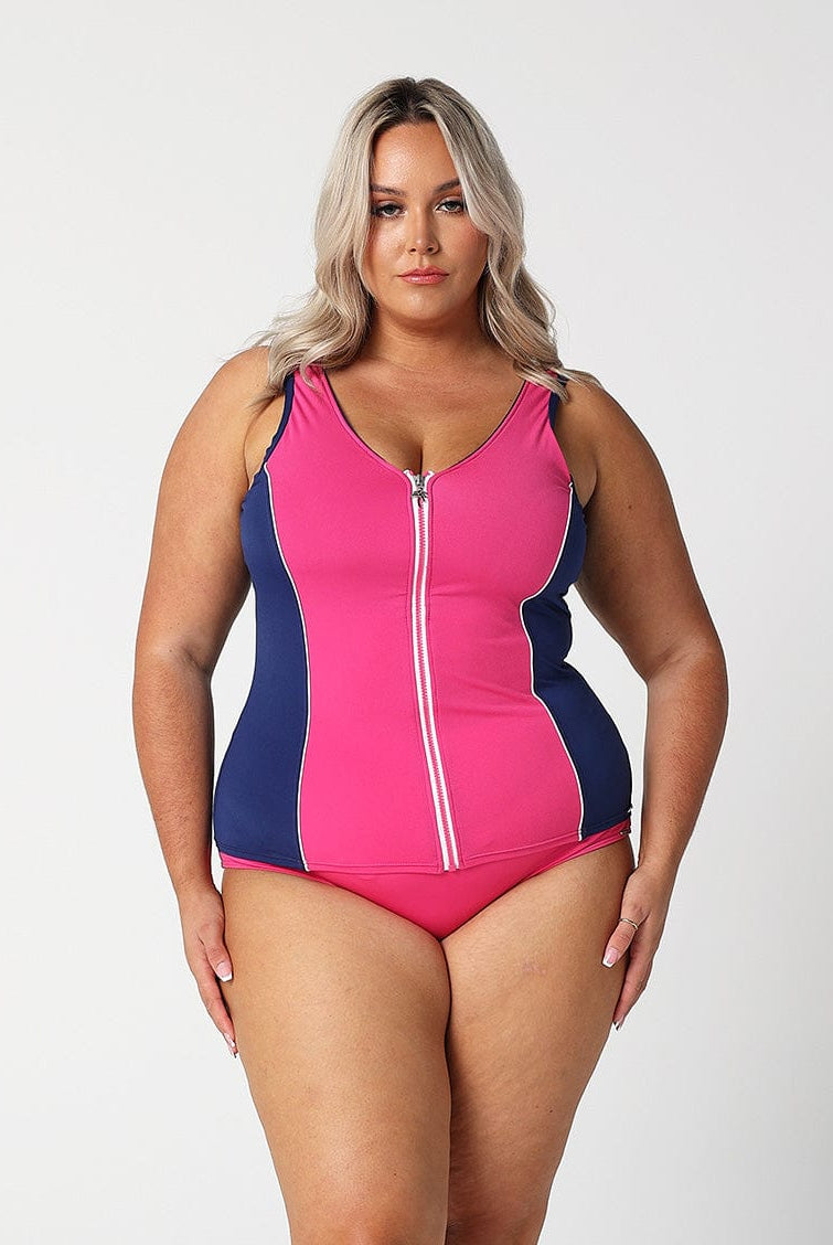 model wearing pink high waisted pant and matching tankini top