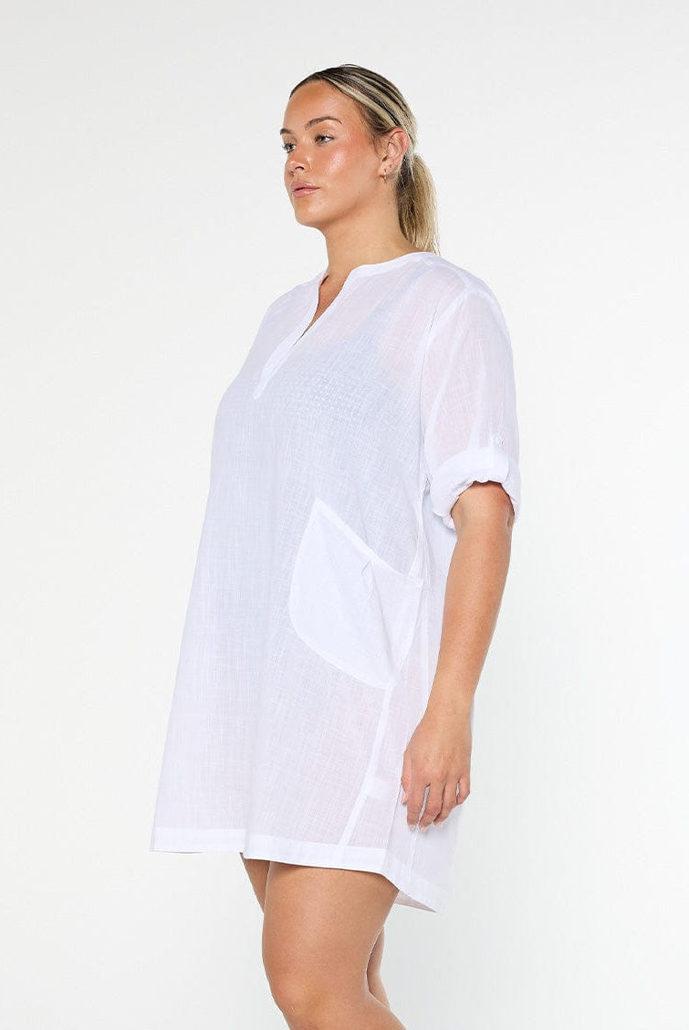 model showing side of white over shirt beach dress