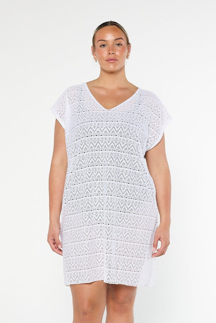 model wearing white mesh cover up