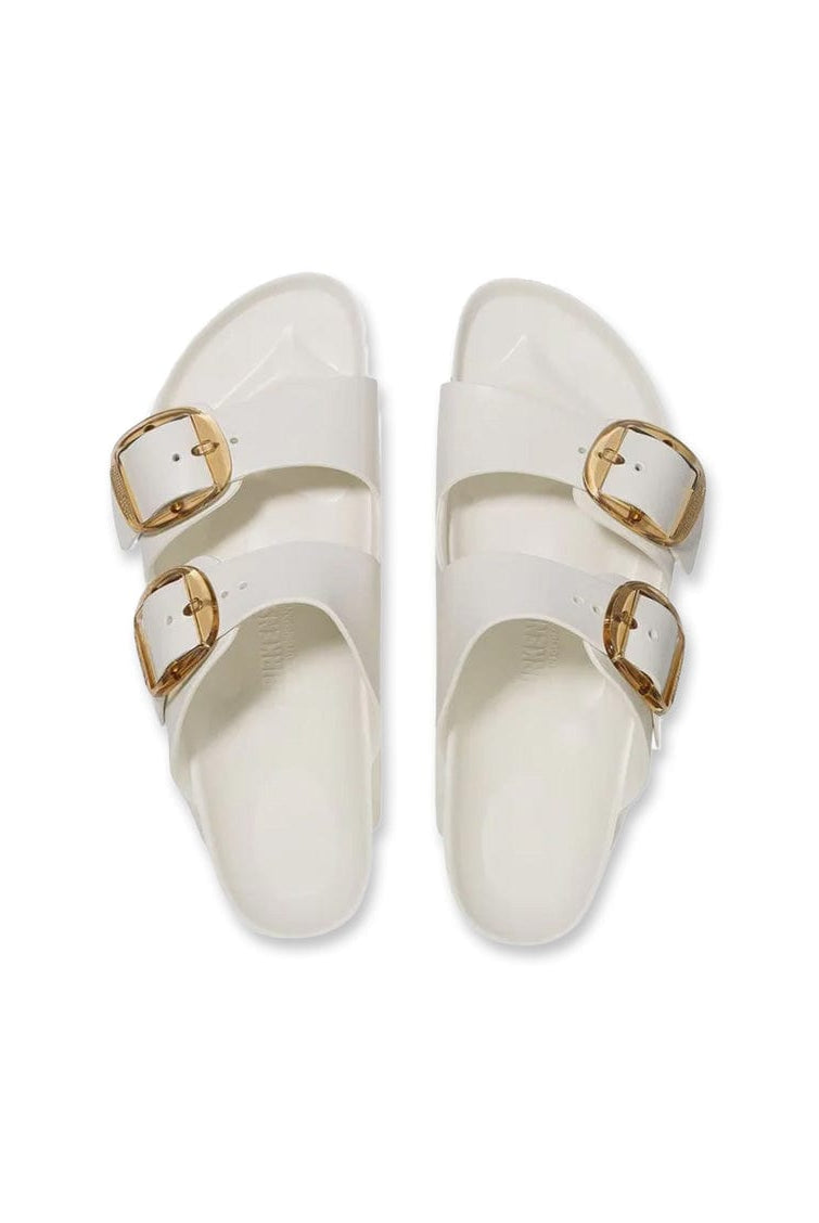 White sandals with big buckles